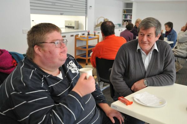 Uniting Care director Brendan Kennedy talks to one of the guests at the refurbished Early Morning Centre in Pilgrim House. The centre, on Northbourne Avenue, Civic, is a place for people living rough to have breakfast or a cuppa and seek advice on their living issues. Funded by a $750,000 grant from the ACT Government, the centre now has a new dining area, kitchen, bathrooms, laundry and office space and will allow the centre to extend its hours and services past the breakfast and morning period. Anyone interested in volunteering to help run the centre can call manager Chris Stokman on 6247 5041. Photo by Silas