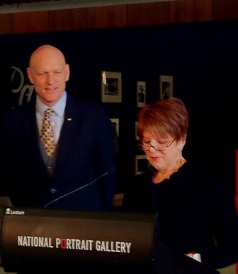 Peter Garrett and NPG director Louise Doyle in front of Kelly photos