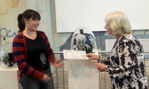 Annette Blair receives her  certificate from Janie McOmish