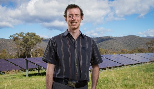 Lawrence McIntosh from SolarShare, at a small solar array in Kambah.