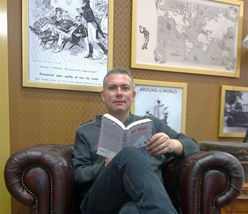 John Brookes  'travels' in his armchair
