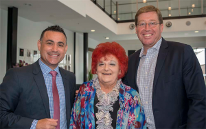 New besties… irrepressible Coralie Wood with the member for Monaro, John Barilaro, left, and NSW Deputy Premier and Arts Minister Troy Grant, at The Q. Photo by Gary Schafer 