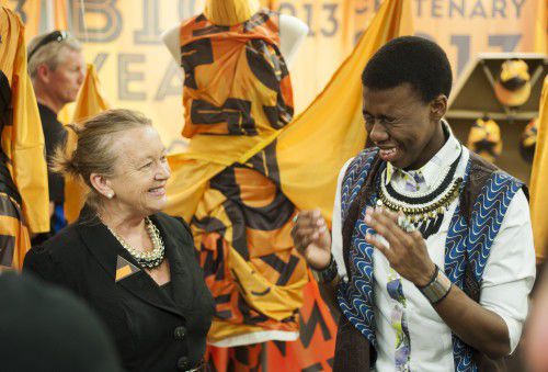 Minister for the Arts, Joy Burch MLA and Reuben Bokaba with his winning design “Canberra Autumn Winds.” Photograph Martin Ollman.