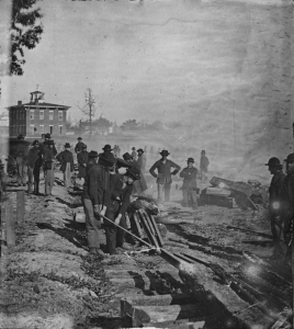 Sherman's men destroying a railroad in Atlanta. 