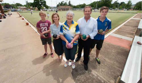 President of the Queanbeyan Women’s Bowling Club, Margaret Davies (centre), with Nichole and Tim Overall and their sons, left, Alex, 15, and Nick, 16. Photo by Holly Treadaway