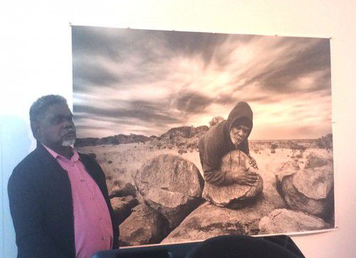 Nakarrma with Thompson's image of healer Cyril Nalkin McKenzie