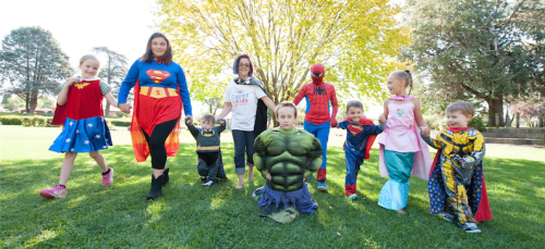 Superheroes to the fore… from left, Anna Armstrong, 7; Hannah Foggett, 13; Noah Downey, 2; organiser Heather Foggett; Zach Armstrong, 7; Mitchell Armstrong, 10, Ty Couch, 4; Kayla Couch, 8, and Dominic Downey, 4. Photo by Holly Treadaway