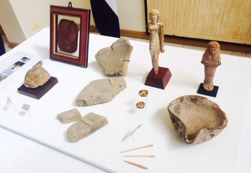 The returned objects (framed Coptic textile top left) 