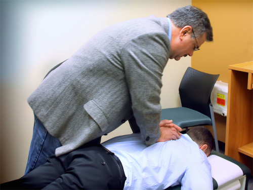 1280px-Chiropractic_spinal_adjustment