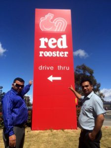 Vik Pandya and Vim Soneri outside the new Charnwood Red Rooster