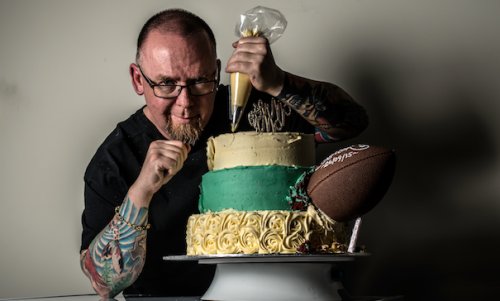 Andrew Ivens and his football wedding cake... “I think there’s a certain type of bride that my cakes appeal to.” Photo by Andrew Campbell