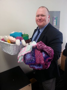 Paul Sweeney drops off some more of his mum’s quilts and bears. 