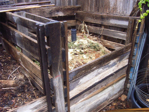 A permanent compost bin made from forklift pallets. 