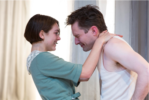 Rose Riley, as Laura, and Luke Mullins as Tom in “The Glass Menagerie. Photo by Brett Boardman. 