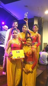 The dancers with their trophy and certificates