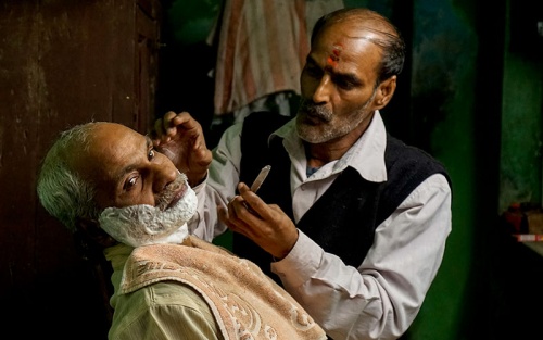 At PhotoAccess, Fiona Bowring-Greer, Man and his barber, Varanasi (detail), 2015, inkjet print