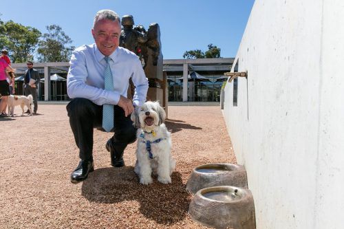 Dr Brendan Nelson with canine visitor. Photograph by Daniel Spellman. 
