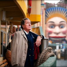 The Eye of the Storm - Geoffrey Rush as Basil Hunter on a ferry near Luna Park_ Sydney by Matt Nettheim