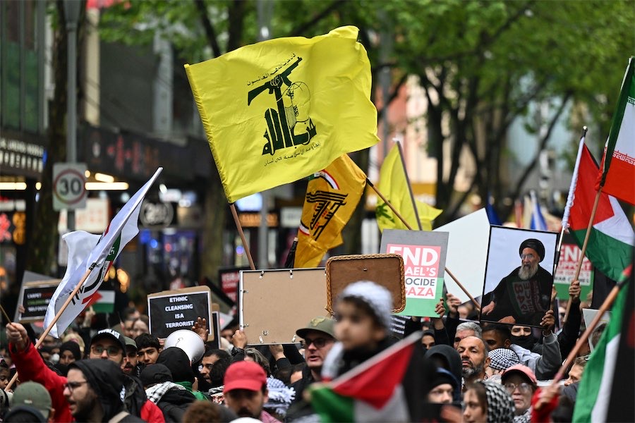 Protesters wave Hezbollah flags at Australian rally