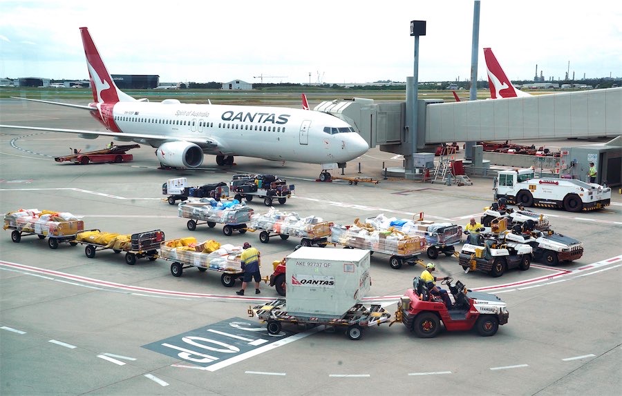 Qantas apologises to jettisoned staff amid $200m threat