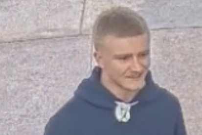 Police seek tattooed man over pharmacy assault
